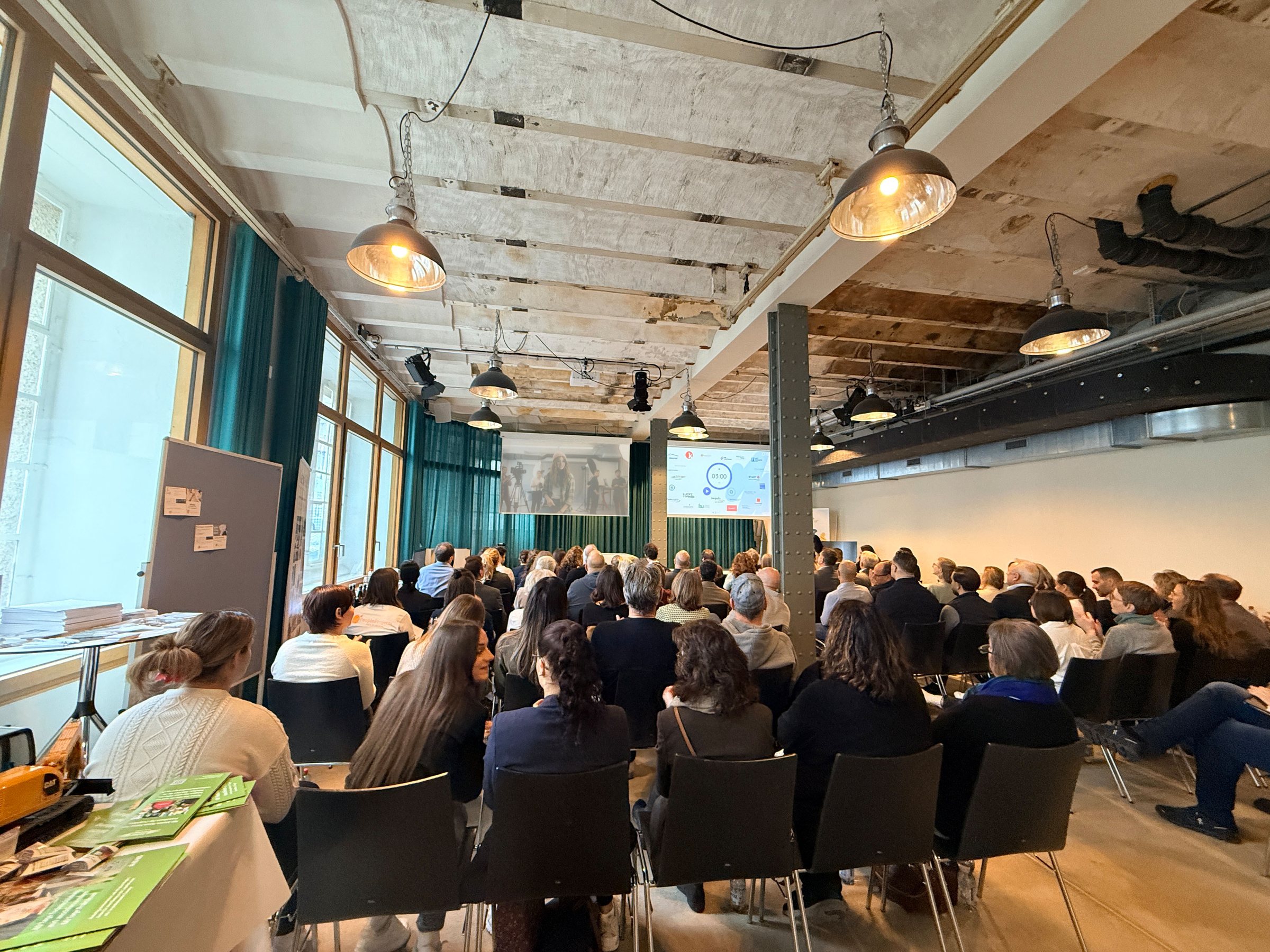 Publikum beim Pitch